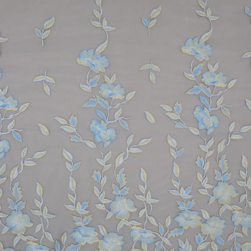 Off White Tulle with Blue and Champagne Leaf Design Embroidered Fabric